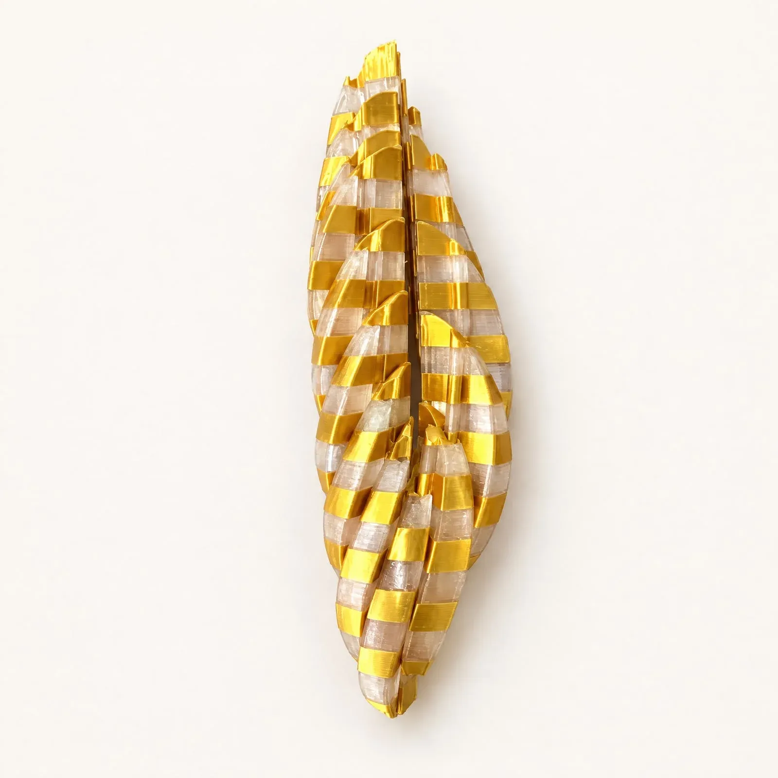 Twisty Egg Fidget in Gold Silk — real photo, background retouched